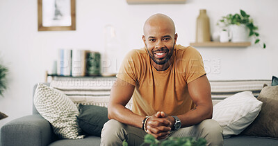 Buy stock photo Man, portrait and smile in home with relax, weekend break and chill on sofa. African person, happy and stress free on living room couch for rest, good mood and enjoy me time in apartment lounge