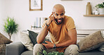 Portrait, smile and thinking with man on sofa in living room of home for ideas, planning or rest. Mental health, mindset and pointing with confident person in apartment for inspiration or optimism