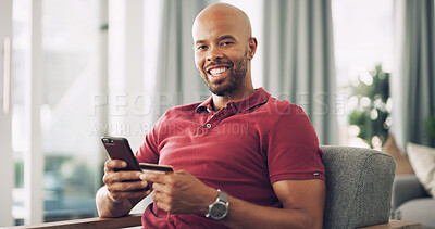 Buy stock photo Portrait, black man and smartphone with credit card in home, password information and online shopping. Sofa, happy person and mobile with debit for ecommerce, payment and subscription for application