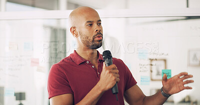 Buy stock photo Presentation, speaker and man with mic, training and information for seminar, talking and creative. Business, employee and black person with speech for workshop, conversation and public speaking