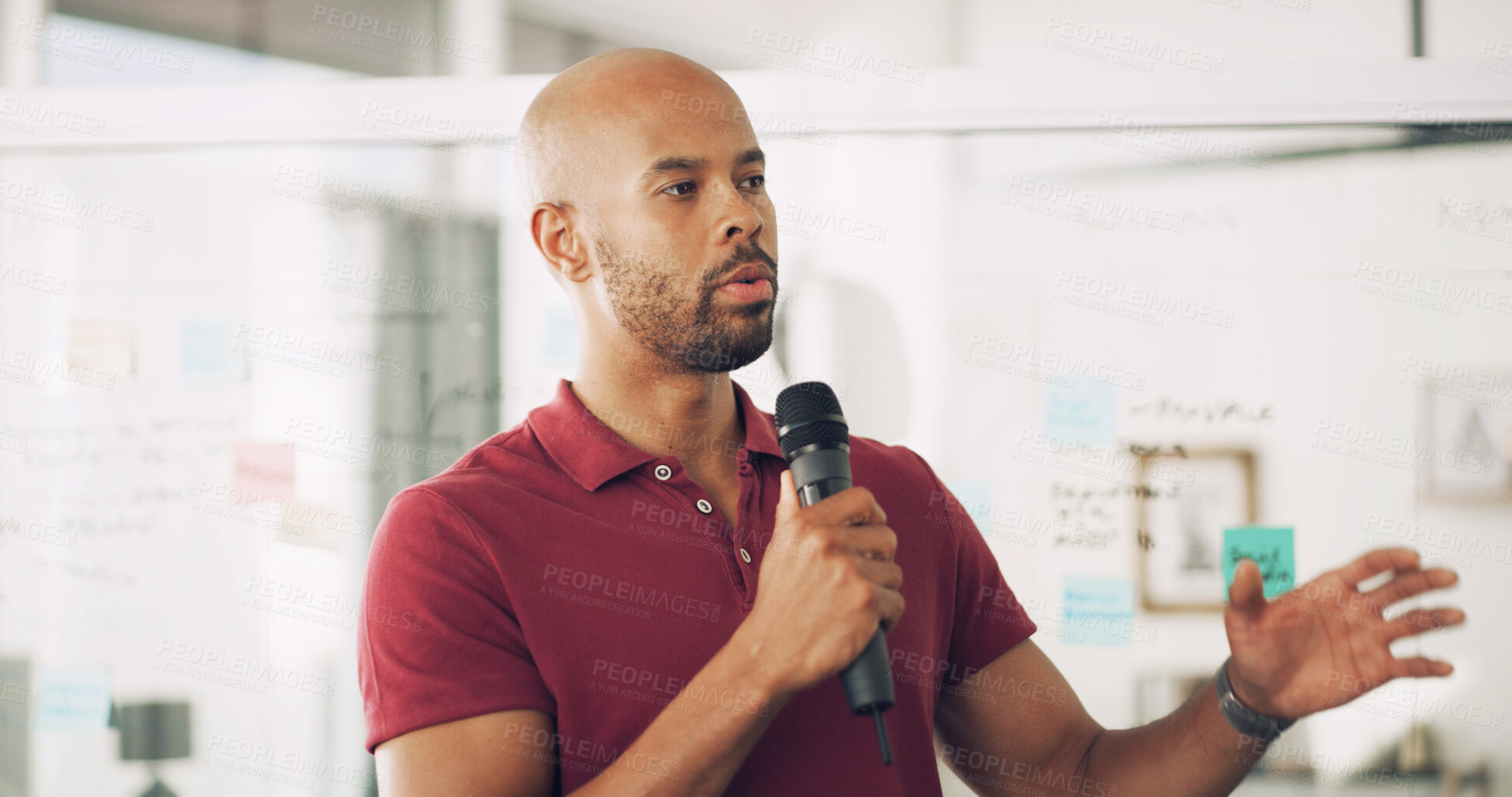 Buy stock photo Presentation, speaker and man with mic, training and information for seminar, talking and creative. Business, employee and black person with speech for workshop, conversation and public speaking