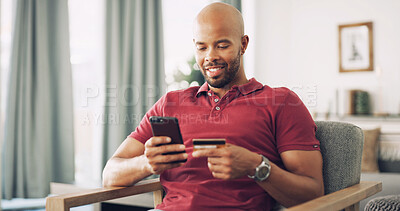 Buy stock photo Sofa, black man and mobile with credit card for payment, password information and online shopping. Home, happy person and phone with debit for ecommerce, transaction and subscription for application