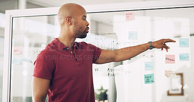 Buy stock photo Planning, glass wall and man with sticky note, office and ideas for agenda, brainstorming and business. Presentation, media analyst and pointing for project, person and audience research for agency