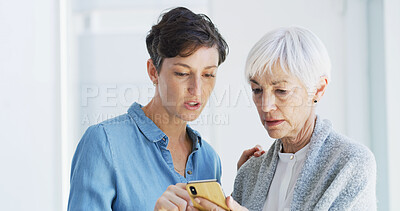 Buy stock photo Phone, help and woman with senior person for mobile app, internet and assistance in home. Retirement, caregiver and women talking on smartphone for communication, connection and info for telehealth