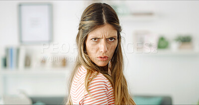 Buy stock photo Angry, conflict and portrait of woman in home living room for disappointment, frustration or attitude. Annoyed, cross and frown of unhappy female person in apartment for tantrum, emotions or stress
