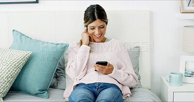 Buy stock photo Woman, smartphone and happy with texting on sofa, chat or check notification in living room at in home. Person, smile and scroll with phone, mobile app and contact on social network at apartment