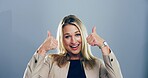 Portrait, thumbs up and woman with feedback, agreement and confidence on gray studio background. Face, person and model with hand gesture, review or icon with symbol, perfect and like with emoji