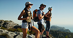 Friends, hiking and view with people on mountain, travel and adventure with group backpacking in nature. Summit, support and women with man outdoor, trekking and tourism with sightseeing in Thailand