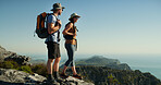 Couple, hiking and people on mountain with horizon, adventure and travel for backpacking in nature. Summit, support and vacation, woman and man trekking for view and sightseeing space in Thailand