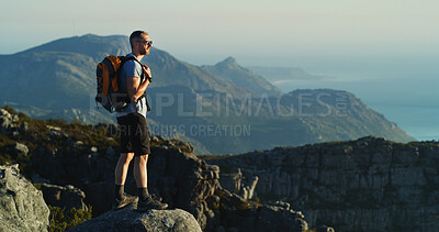 Buy stock photo Hiking, travel and vacation with man on mountain for fitness, adventure and peace. Health, nature and hiker trip with person and outdoor view on cliff for trekking holiday, explore and mountains