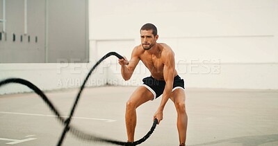 Buy stock photo Fitness, man and battle ropes outdoor for core strength workout, power training and muscular endurance. Athlete, person and energy with exercise equipment for agility, health performance or challenge
