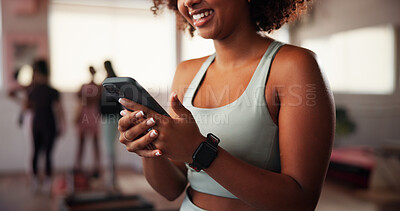 Buy stock photo Hands, phone and app at gym with fitness, contact or excited with smile for stats with wellness. Woman, smartphone and check for progress, report and happy for results with workout at exercise club