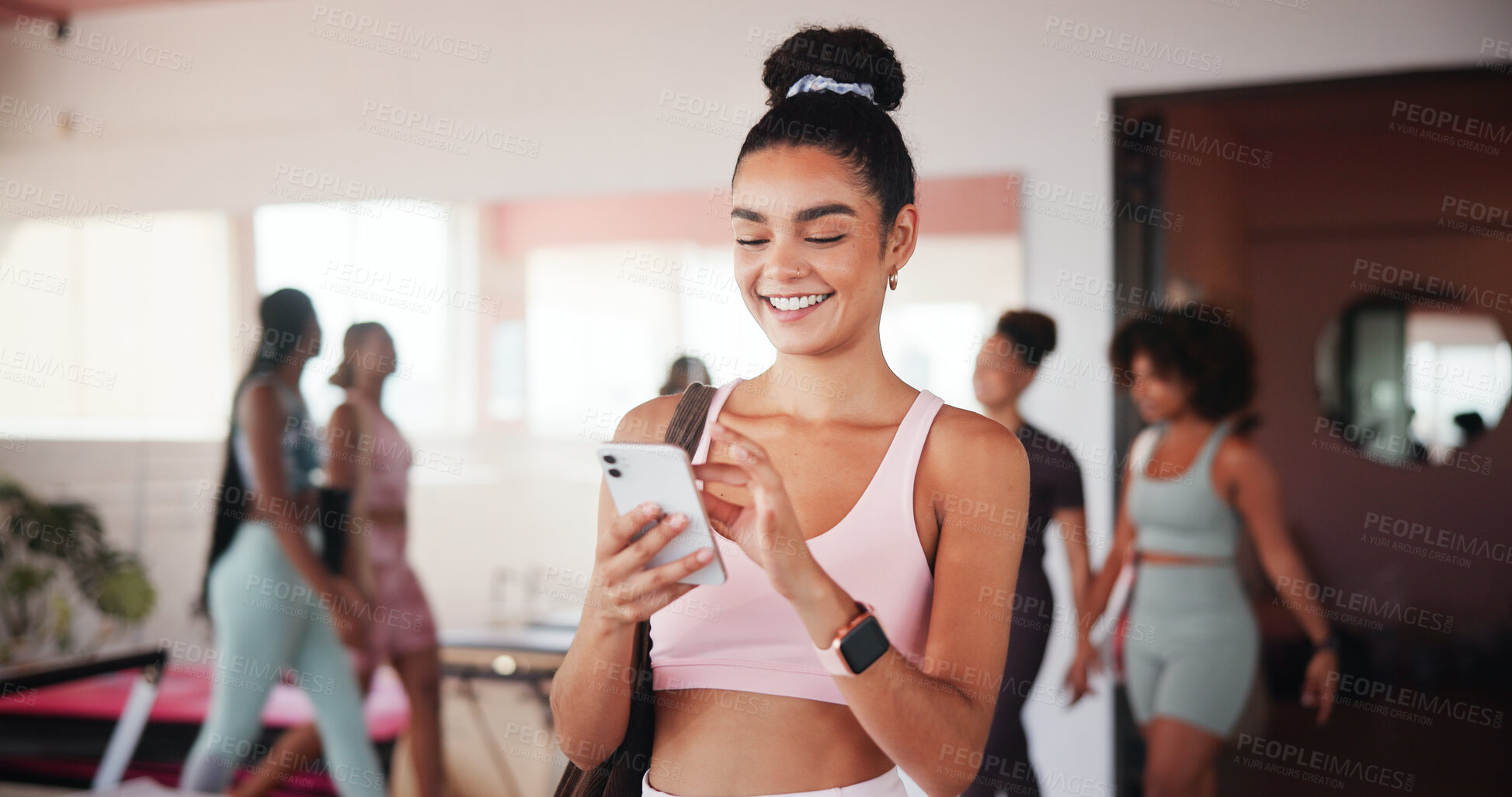 Buy stock photo Woman, smartphone and texting at gym with smile, contact and excited with stats at fitness club. Girl, phone and mobile app for progress, report and happy for results with web chat at exercise class