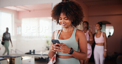 Buy stock photo Fitness, happy woman and chat with mobile in gym, health club and application for scroll. Walking, female person and online with phone for exercise video, social media and virtual tutorial for cardio