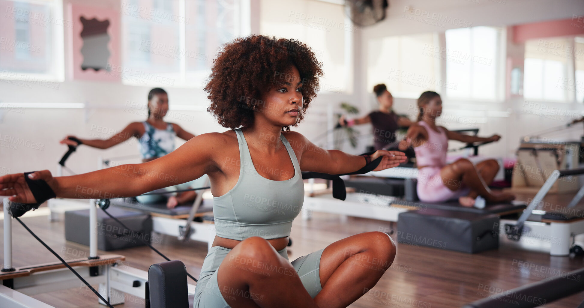 Buy stock photo Fitness, pilates and reformer with woman in gym for improvement, training or workout routine. Equipment, exercise and studio class with person on resistance machine for challenge or performance