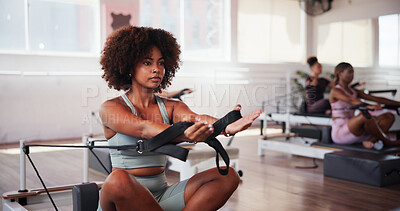 Buy stock photo Woman, pilates chair and workout at gym for fitness, strength and core muscle development at club. Person, equipment and training for strong abdomen, transformation and healthy body at exercise class