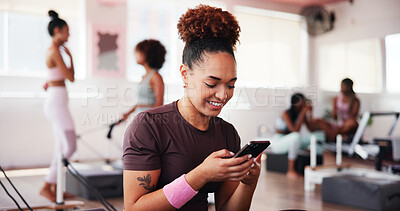 Buy stock photo Gym, woman and smile with mobile for fitness, exercise video and scroll reel on social media. Health club, female person and happiness with phone for virtual tutorial, workout break and streaming app