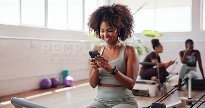 Buy stock photo Gym, happy woman and application with phone for fitness, health club or streaming for reel. Online, female person and smile with mobile for exercise video, social media or virtual tutorial for cardio