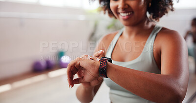 Buy stock photo Arm, pilates and watch with woman in studio, tracking performance progress of training routine. Exercise, fitness and time with hands of athlete in gym class for challenge, milestone or workout