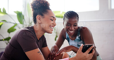 Buy stock photo Friends, laugh and phone in gym for social media, show post and fitness app for wellness. Women, gossip and mobile in pilates studio for story, connectivity and funny message on platform
