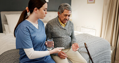 Buy stock photo Pills, water and nurse with senior man in home for medication, supplements or vitamins for wellness. Health, helping and caregiver with elderly patient for tablets with treatment in nursing facility.