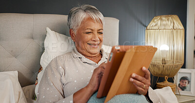 Buy stock photo Senior, smile and tablet with woman in bed to relax for social media or streaming subscription. App, break and video with happy mature person in bedroom of home at night for retirement or wellness