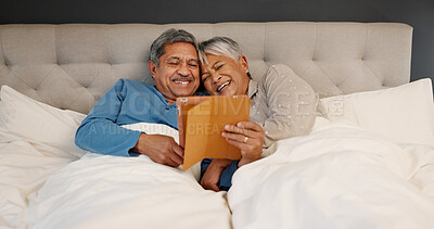 Buy stock photo Bedroom, old couple and happiness with tablet for streaming comedy, reading news and entertainment. Senior people, man and woman with laugh for digital joke, funny video or bonding in morning at home