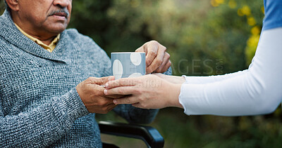 Buy stock photo Coffee, caregiver and senior man in wheelchair in garden at retirement home for relaxing morning. Calm, peace and nurse helping elderly male patient with cup of green tea for health outdoor.