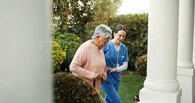 Buy stock photo Retirement home, caregiver and senior woman with walking stick outdoor for mobility support, rehabilitation or healing. Assisted living, nurse and elderly person with cane for recovery and assistance