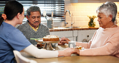 Buy stock photo Cake, praying and nurse with senior people for birthday, good news or celebration of treatment success. Dessert, religion and caregiver with elderly couple for party at assisted living home together.