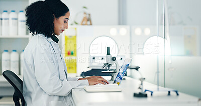 Buy stock photo Laboratory, scientist and woman with laptop for typing, medical research and investigate at night. Career, female person and doctor with digital for pharmaceutical review, medicine report and reading