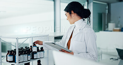 Buy stock photo Bottle, scientist and woman on tablet in lab for research, medical innovation and discovery. Health, sample testing and doctor with cure for pharmaceutical review, medicine report and reading label