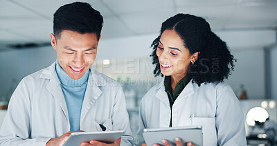 Buy stock photo Tablet, teamwork and scientists in laboratory at night for medical research with pharmaceutical discovery. Meeting, digital technology and science professionals with report for healthcare innovation.