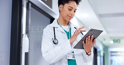Buy stock photo Doctor, tablet and woman in hospital for medical news, report and check records for telehealth. Tech, reading and healthcare professional on internet for communication, wellness email and research