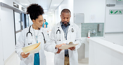 Buy stock photo Healthcare, doctors or folder in hospital for discussion, diagnosis feedback or patient chart for advice. People, cardiology specialists or paper in clinic for information and brainstorming treatment