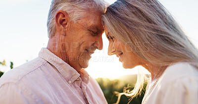 Buy stock photo Senior couple, care and forehead touch for love, strong connection and healthy relationship. Romance, happy man and woman outdoor for bonding together, loyalty or commitment to marriage in retirement