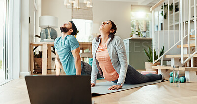 Buy stock photo Exercise, laptop and yoga with couple cobra pose in living room for bonding, health or wellness stretching. Computer, fitness or holistic with man and woman in home for balance or online course