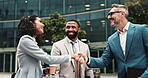 Happy, business people or handshake in city for greeting, meeting or partnership in urban town. Shaking hands, smile or financial advisor with manager for B2B deal, introduction or recruitment deal