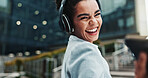 Business, headphones and woman in city, portrait and smile with audio, listening to music and radio. Happy person, employee and consultant in street, cellphone and headset with sound and digital app
