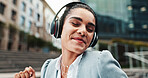 Business, headphone and woman in city, smartphone and dancing with celebration. Person, employee and consultant in workplace, headset and streaming for music, audio and sound with success and smile