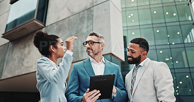 Buy stock photo Finance, talking and business people in city with tablet, news or review for feedback, project or sales. Account manager, teamwork or low angle with tech for collaboration, corporate or discussion