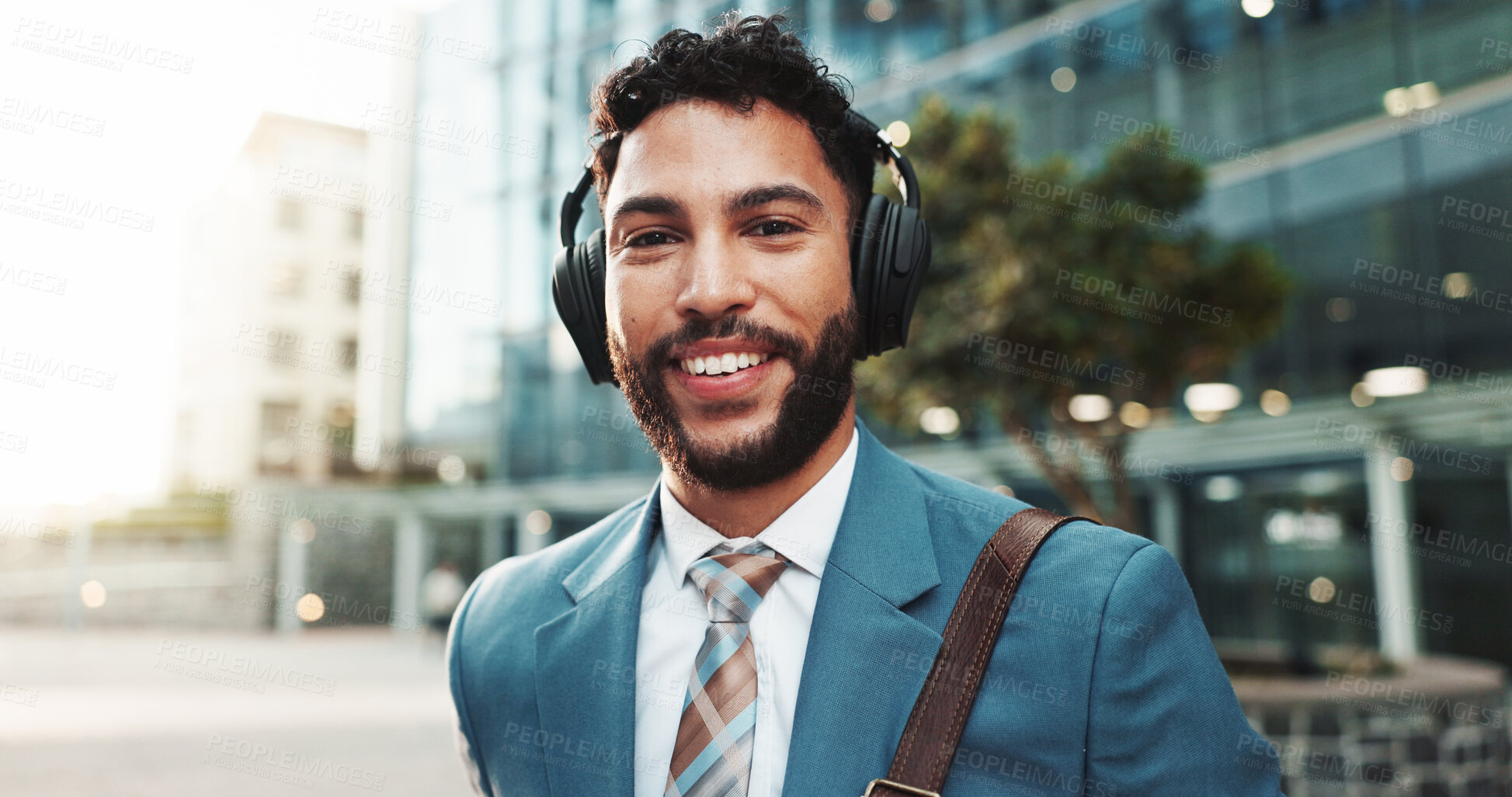 Buy stock photo Portrait, business and man in city, headphones and smile with confidence, listening to music and pride. Face, happy person and employee in street, headset and audio with morning radio and New York
