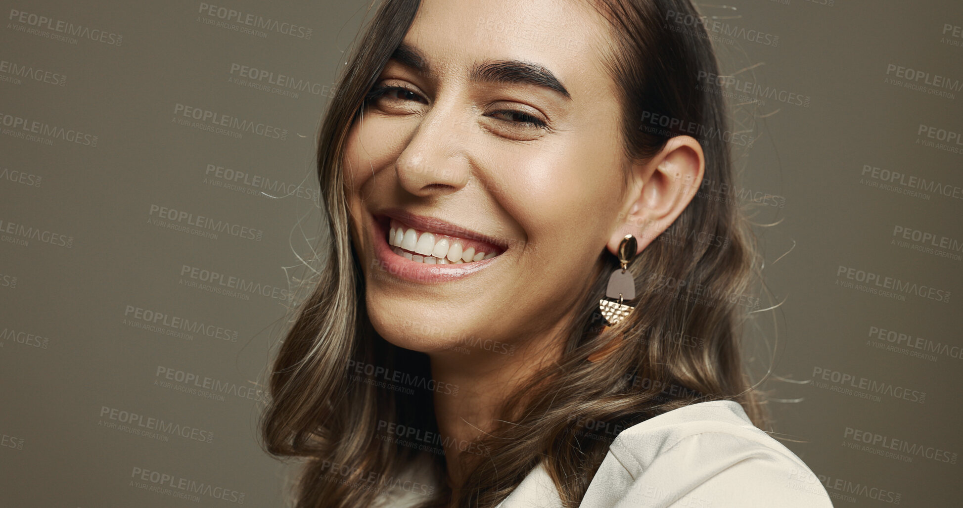 Buy stock photo Portrait, smile and woman with makeup, studio and self expression with cosmetics, model and beauty. Happy, confident and person with glow of foundation, aesthetic and appearance with facial treatment