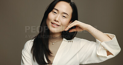 Buy stock photo Skincare, smile and portrait of Asian woman in studio with beauty, natural and facial routine. Glow, space and female person with face dermatology treatment for hydration by brown background.