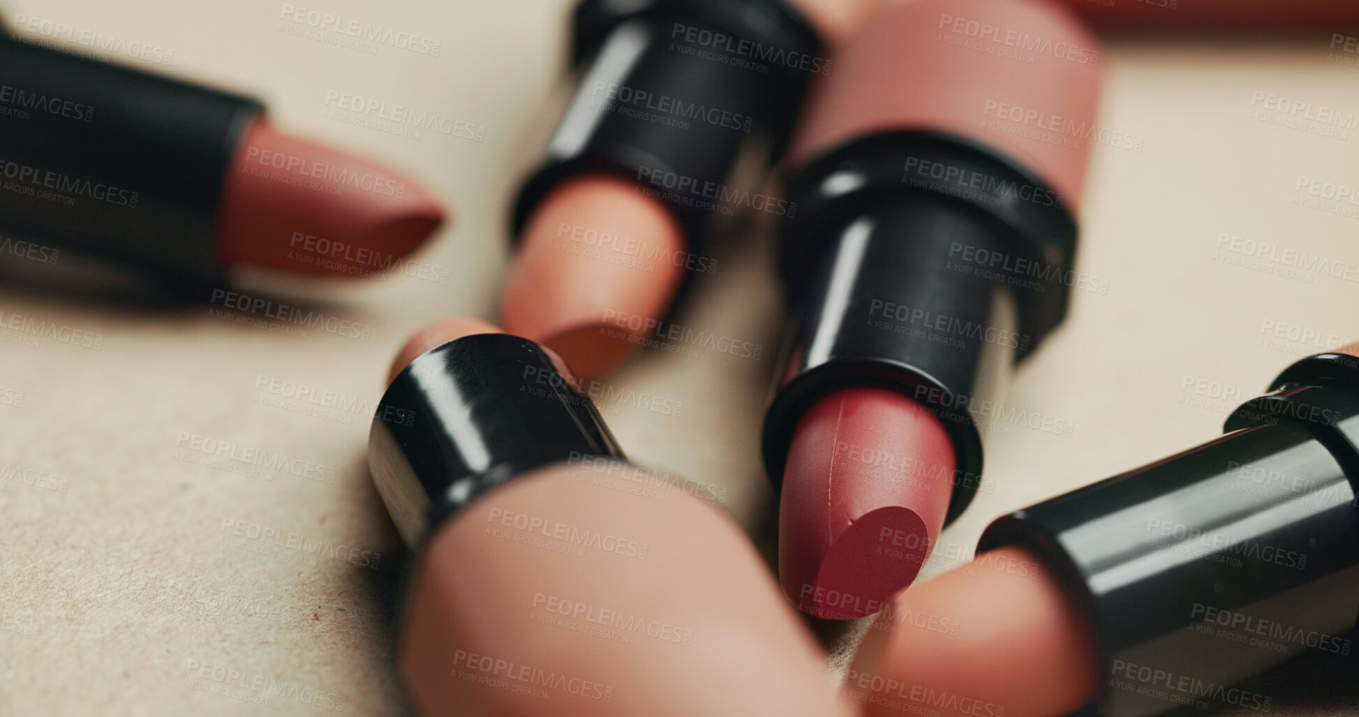 Buy stock photo Product tools, makeup or lipstick in studio for elegance, beauty and luxury cosmetics on brown background. Closeup, aesthetic and dermatology for mouth grooming, makeover and choice for selection