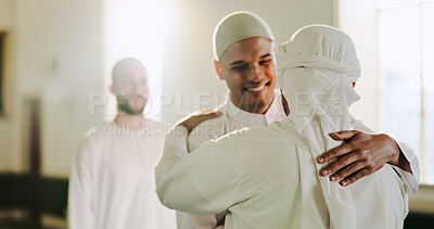 Buy stock photo Muslim, happy and people in mosque, hug and worship for Islamic religion, Ramadan and faith in morning. Fajr, praise and men with respect for Allah, embrace and gratitude to God in temple or belief