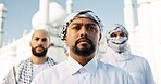 Outdoor, people and Muslim men with traditional clothes, community solidarity or spiritual belief. Islamic group, mosque or friends in city, support or serious with faith, holy temple or Eid Mubarak
