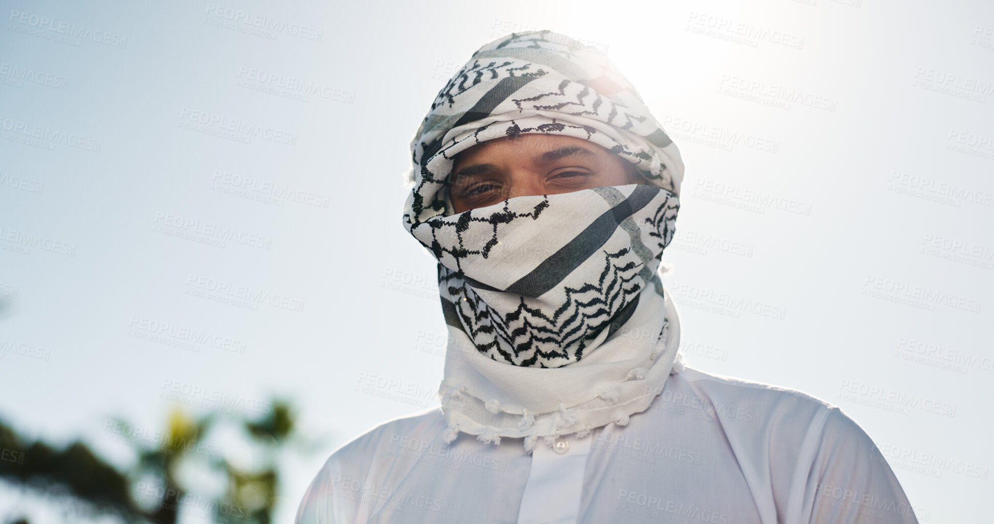 Buy stock photo Portrait, Muslim and man with religion, outdoor and covering face with keffiyeh, belief and worship. Islamic faith, spiritual and person with scarf for prayer, culture and respect for Allah or holy