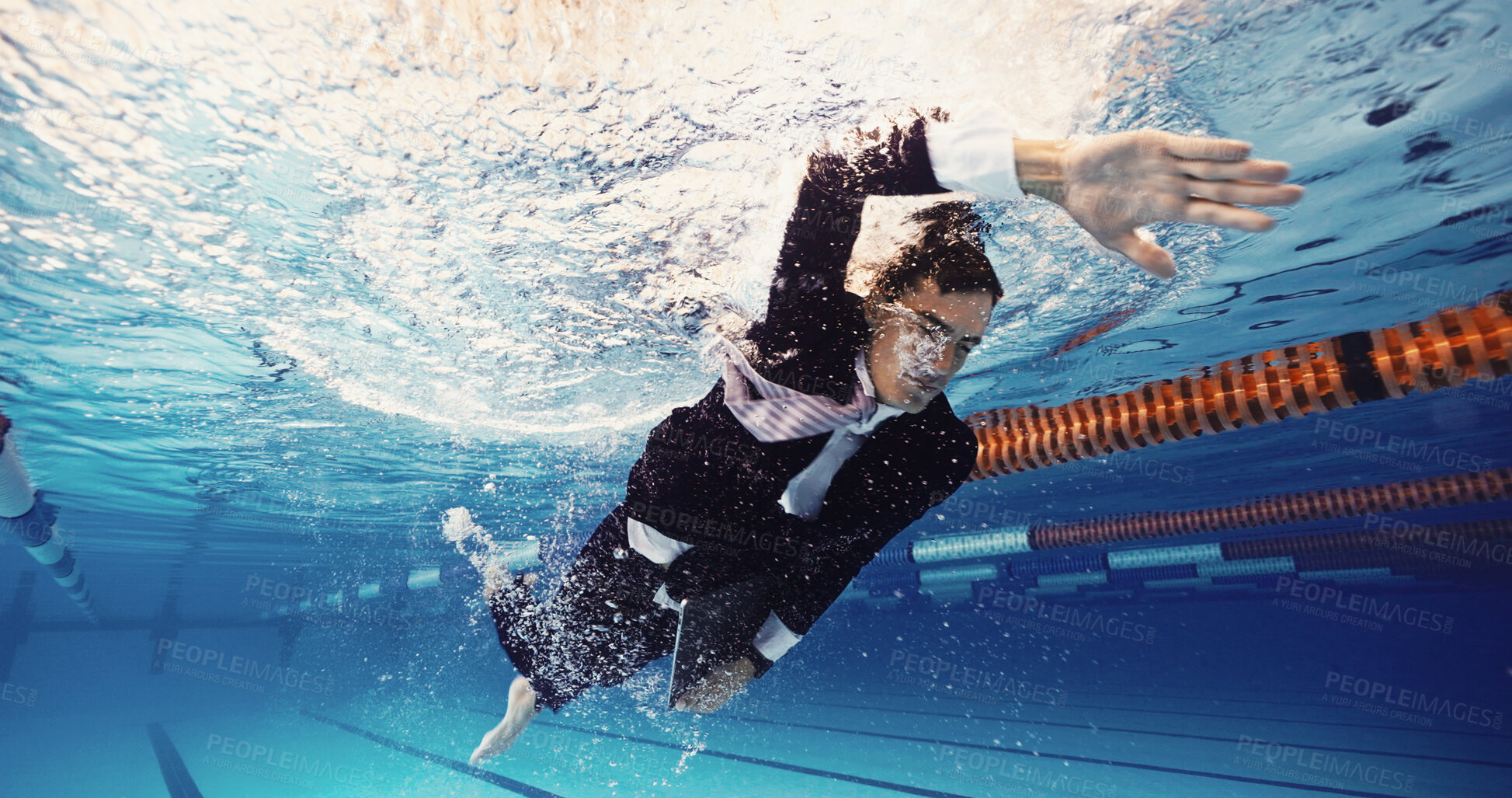 Buy stock photo Swimming, water and businessman in pool, stress and drowning in company debt, laptop and corporate. Financial crisis, entrepreneur and worry for tax return deadline, workaholic and person underwater