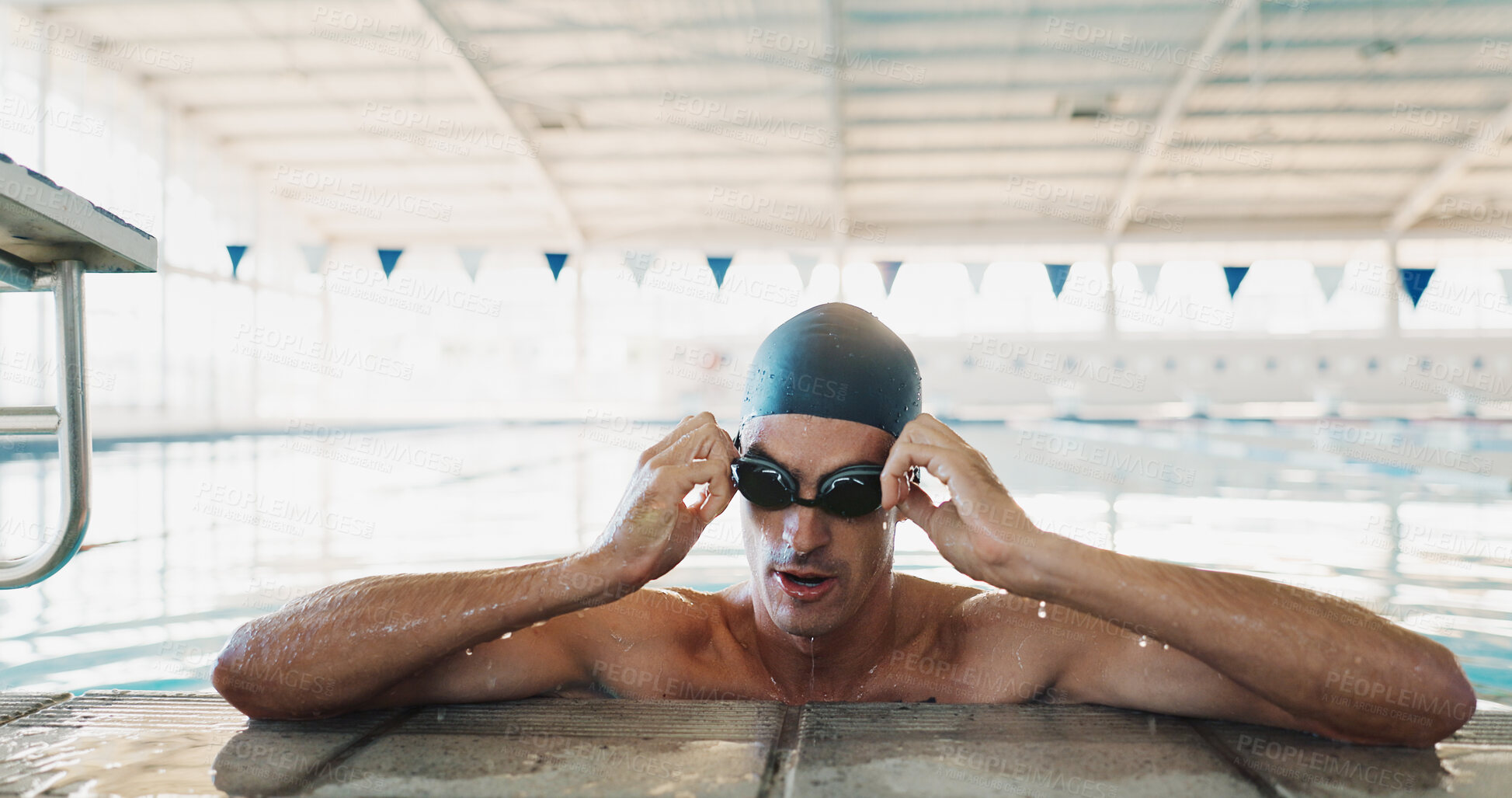Buy stock photo Athlete, man and goggles for swimming in pool of fitness break, water sport and training activity. Male swimmer, preparation or ready for exercise practice, workout competition and cardio performance